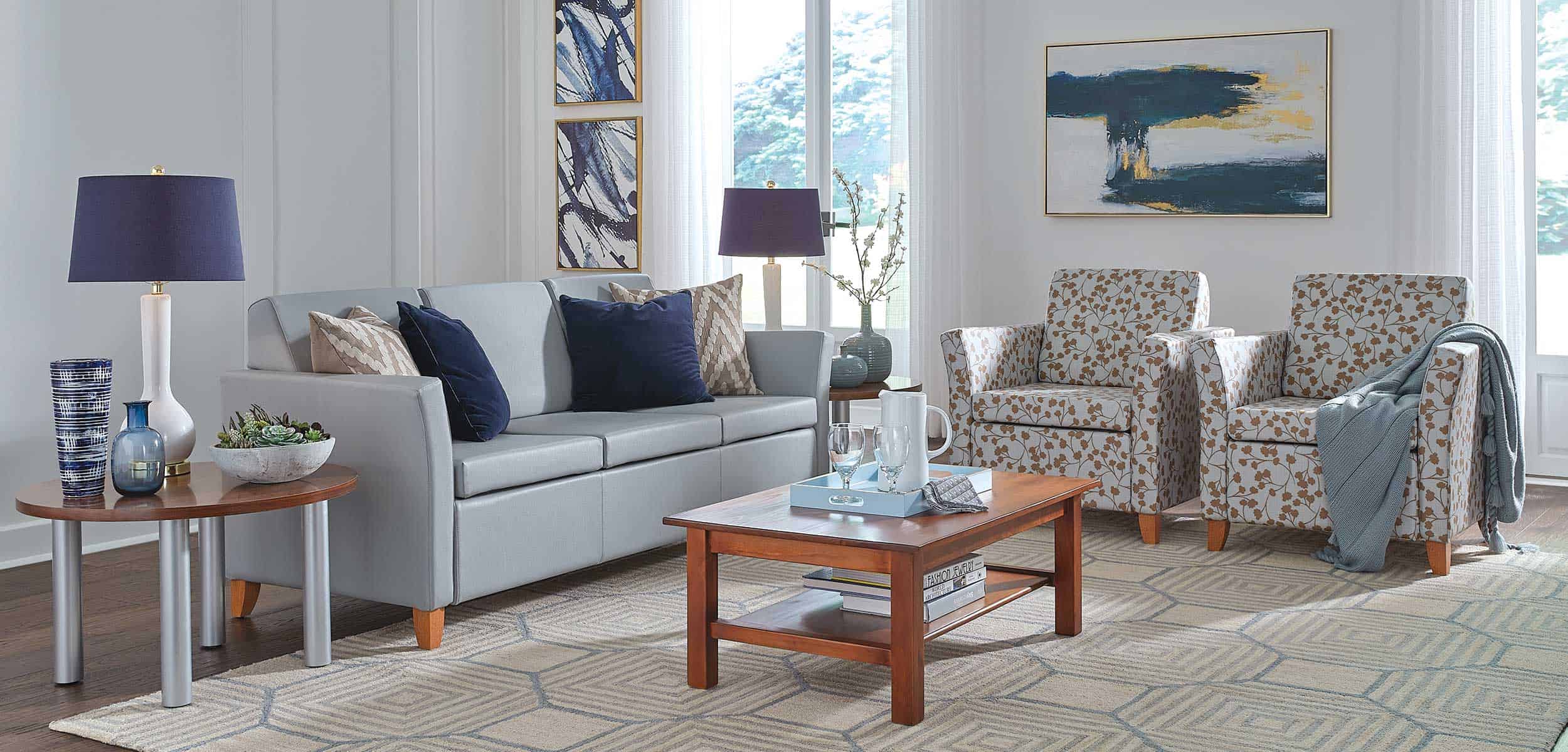 Living room image with Rally sofa and loveseat, Classic coffee table, and Ally end tables