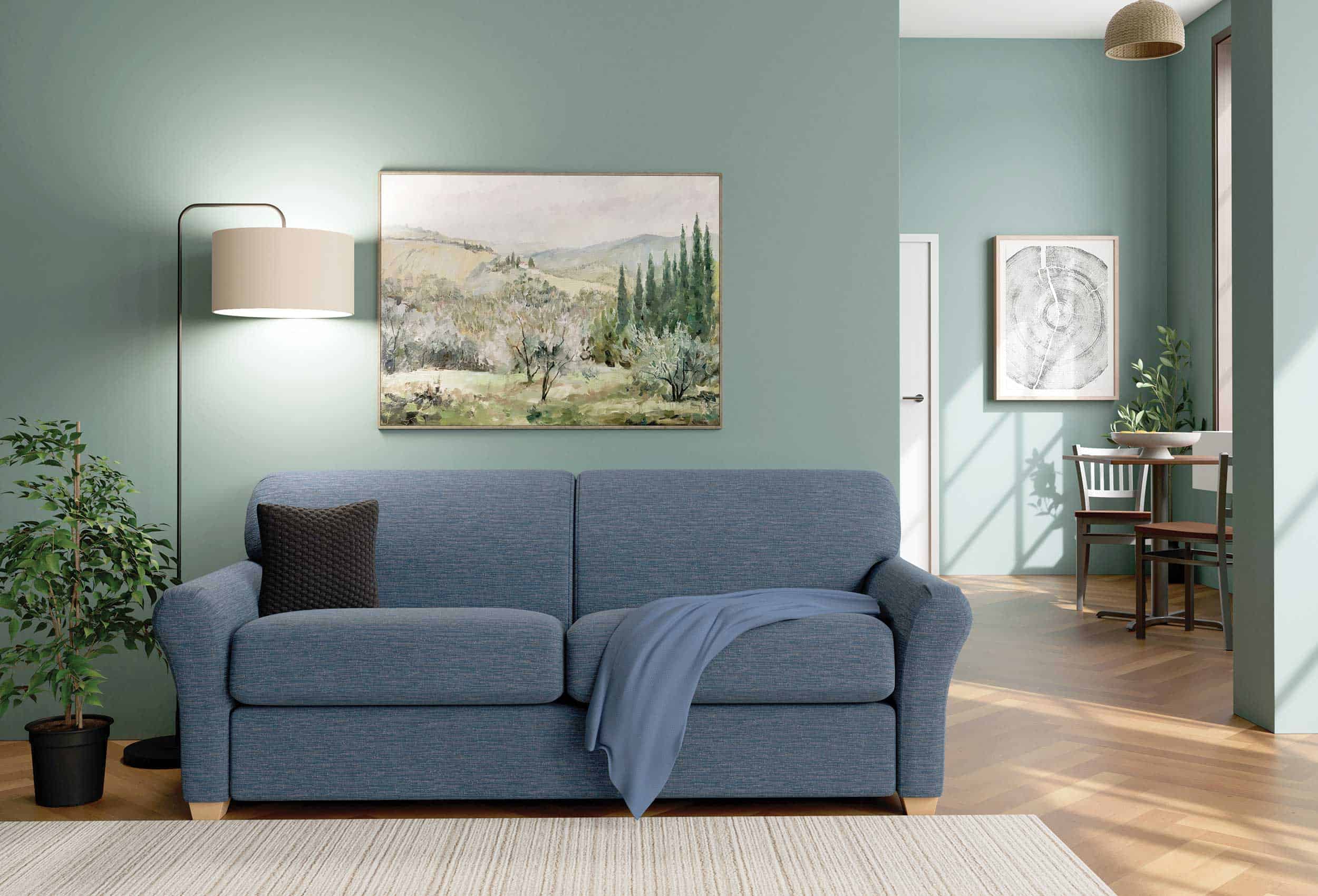 Blue Sofa in Group Home Living Room with small Dining Table and Chairs