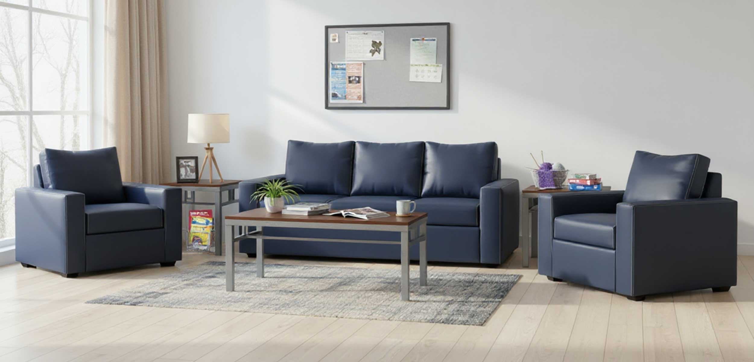 Durable seating and occasional tables in a permanent supportive housing living room.