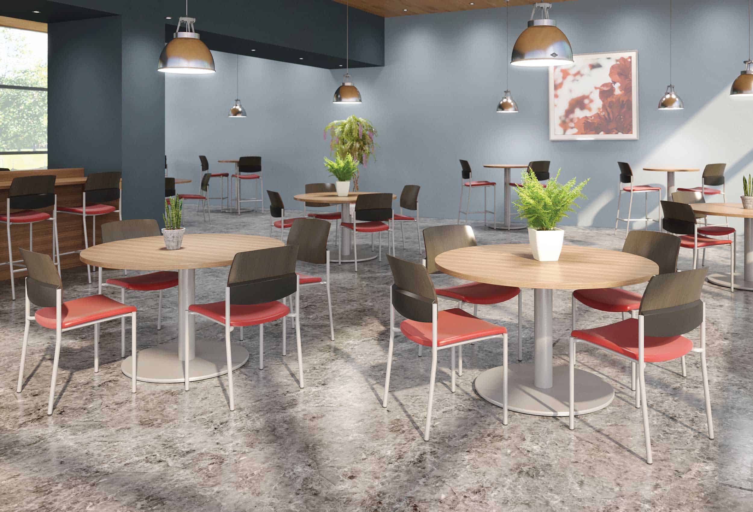 Sturdy laminate-top tables with metal disc bases for transitional housing.